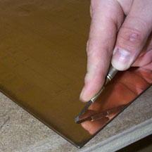 using a burin on a copper plate